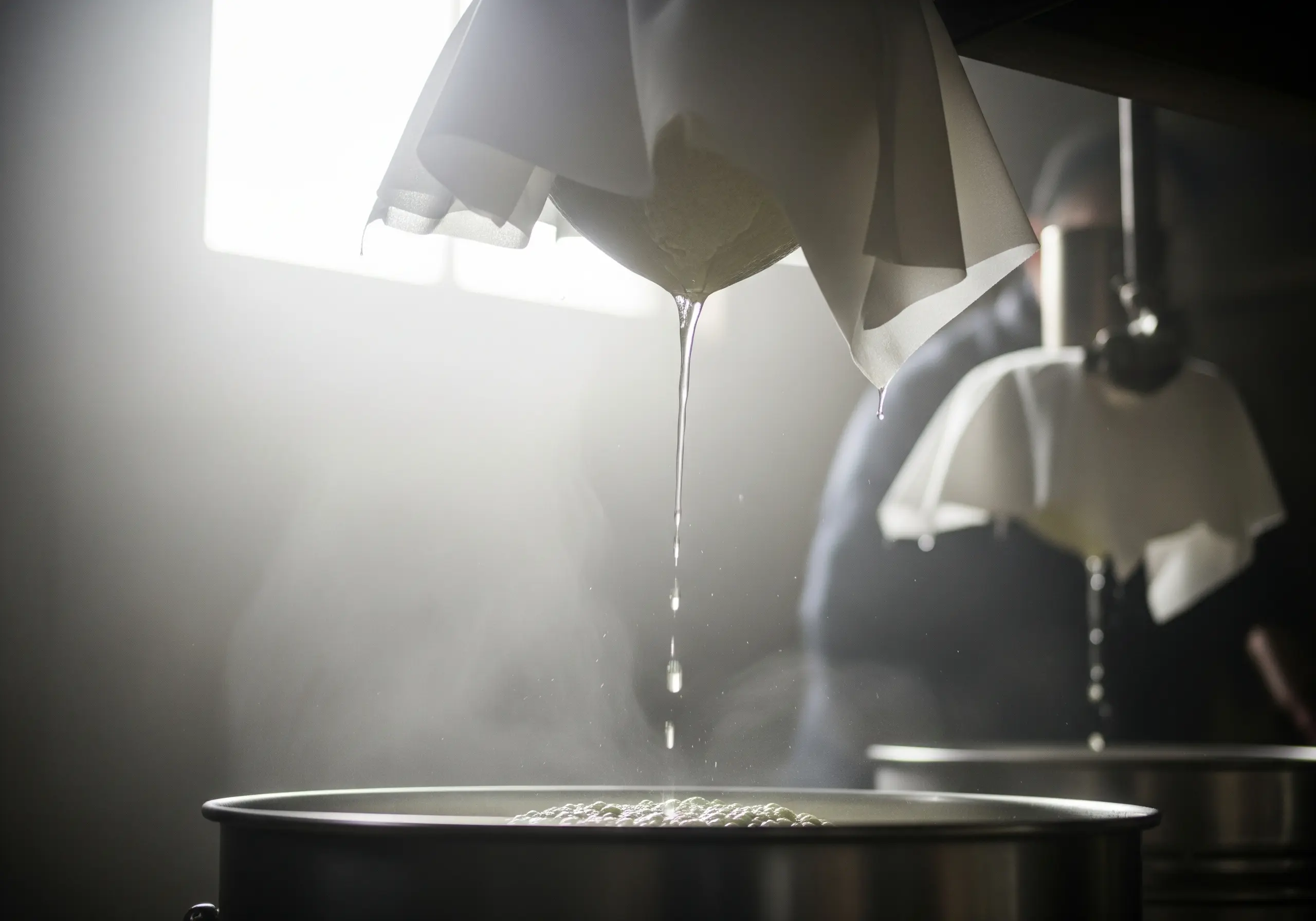 Scene depicting bag hanging with moromi slowly dripping down in a translucent, luminous setting